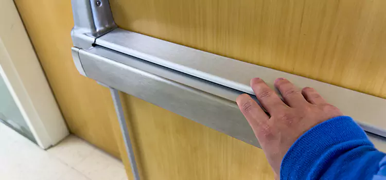 Installing a Push Bar on a Door Piqua